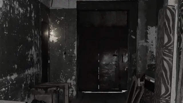 A peeling corridor inside an abandoned plant